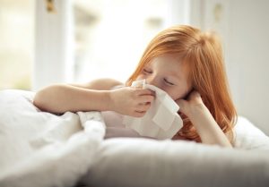 sick-girl-wiping-nose-in-charlotte-nc